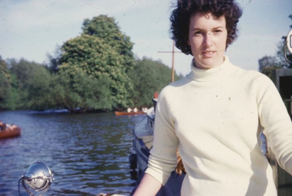 Lee as a young woman, by a river